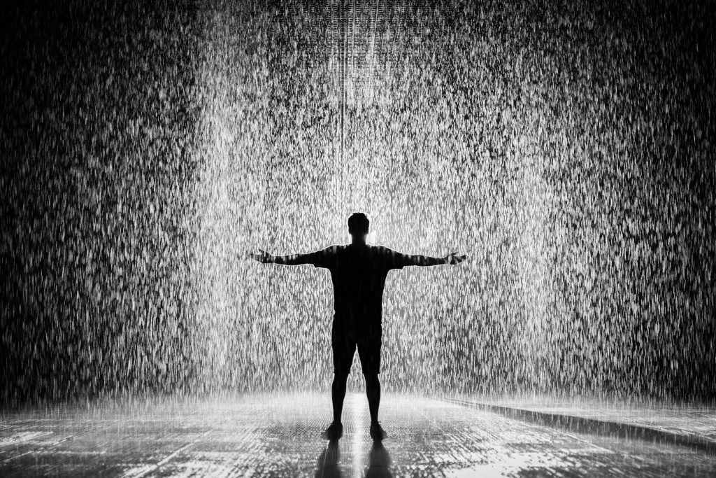 https://www.pexels.com/photo/silhouette-and-grayscale-photography-of-man-standing-under-the-rain-1530423/